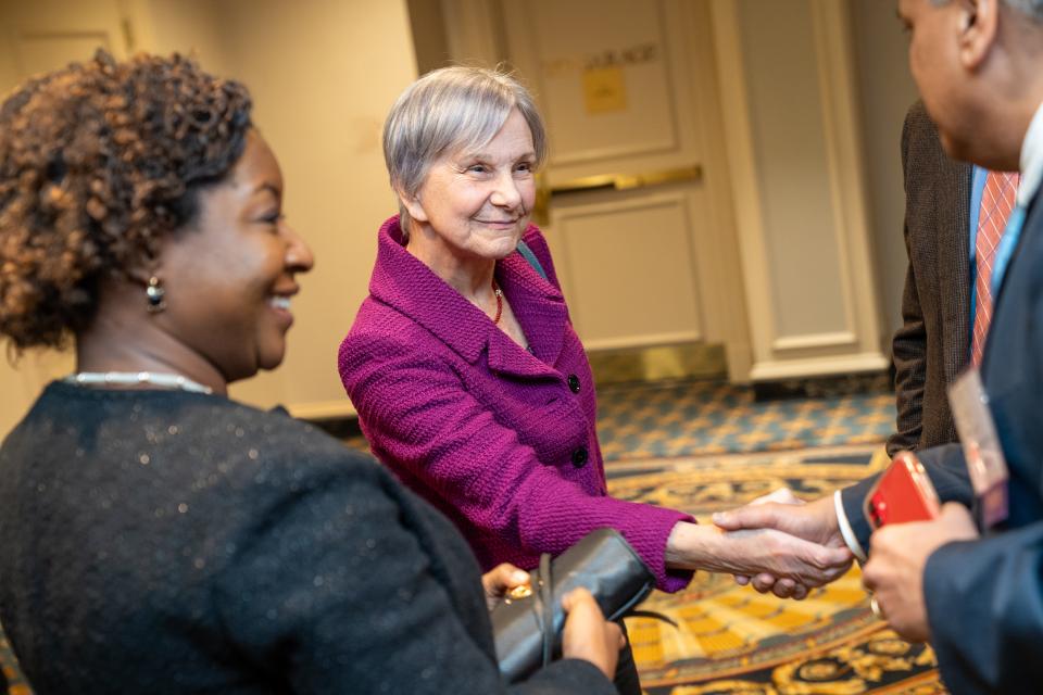 Janet Woodcock, MD, with Esther Krofah, MS, and Amar Bhat, PhD.